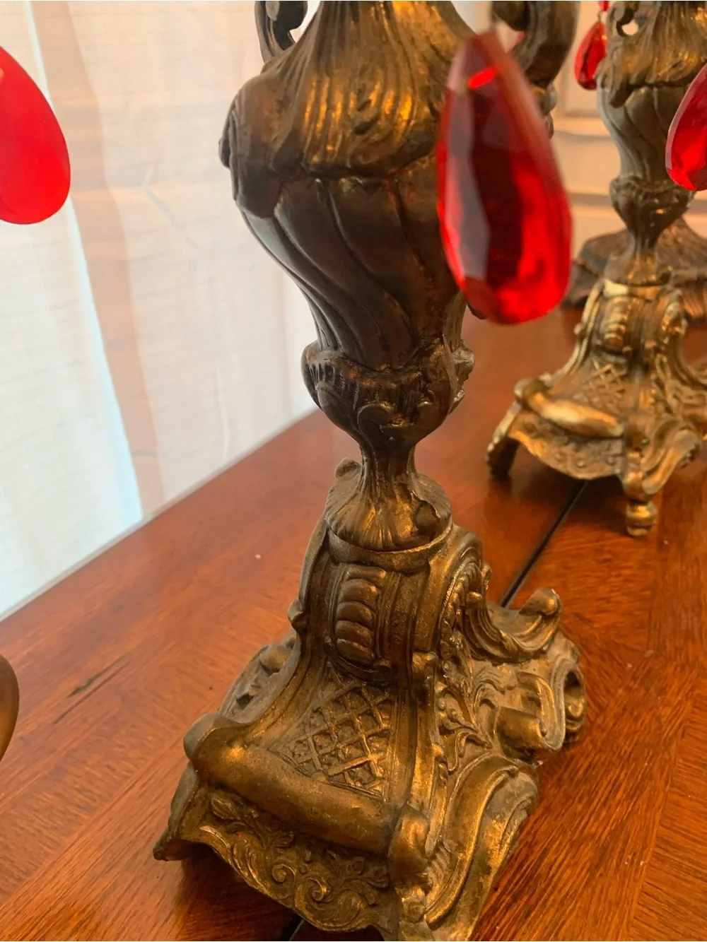 Antique-Style Ornate Brass Candelabra Pair with Red Crystal Drops